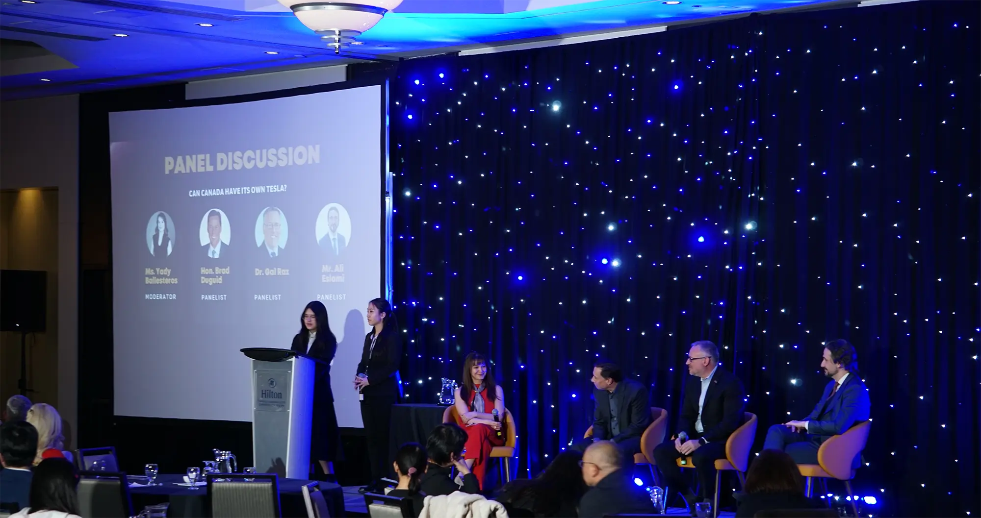 Students and judges collaborating at the AIEC global community event